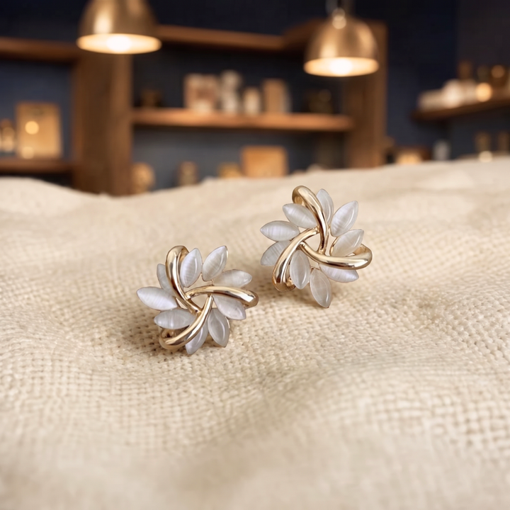 Hoop earrings with opal flowers in gold