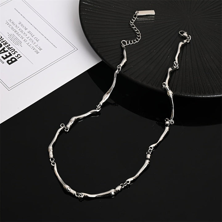 White Gold Necklace with Twisted Wave Design