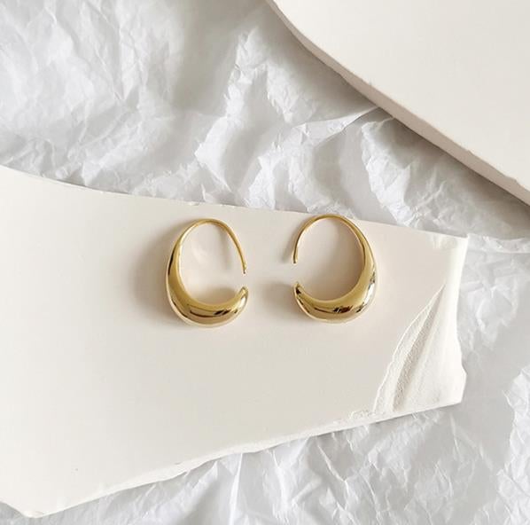 Luxury earrings in gold and silver