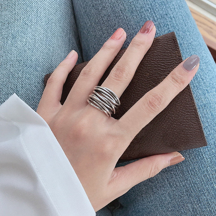 Adjustable silver ring with layers
