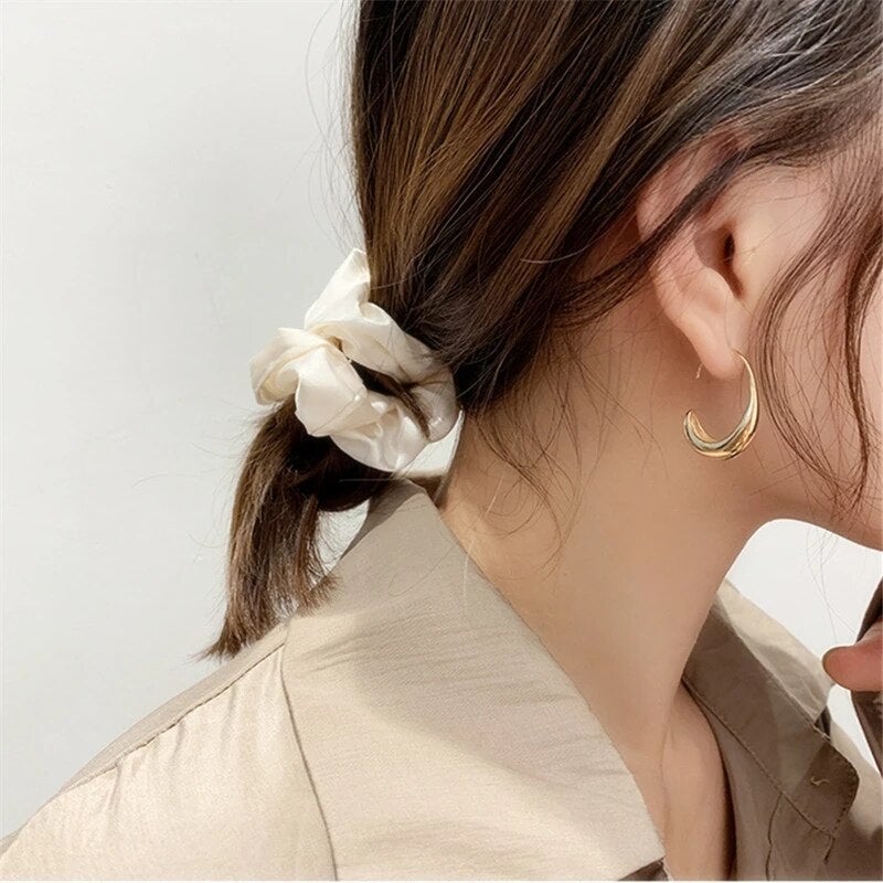 Luxury earrings in gold and silver