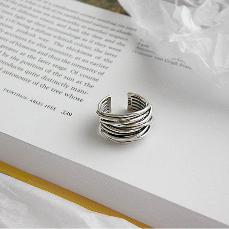 Adjustable silver ring with layers