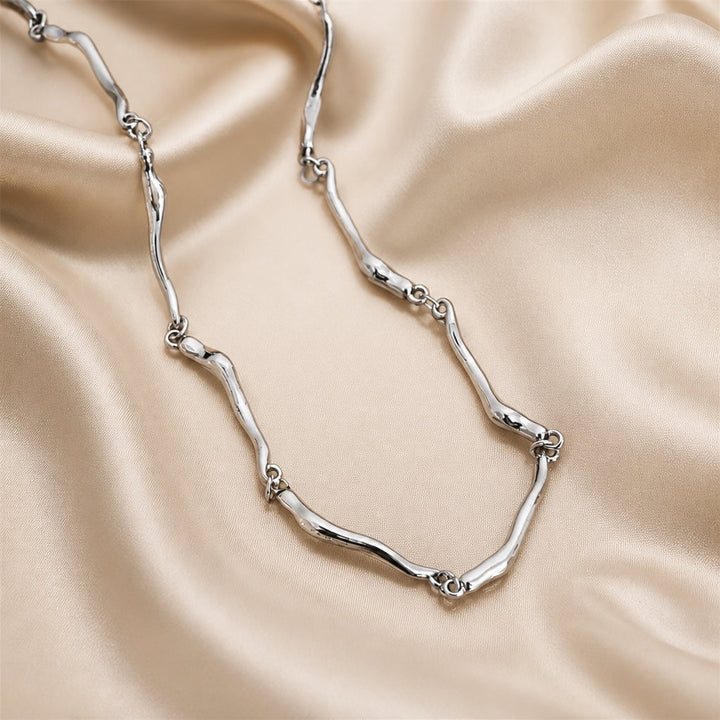 White Gold Necklace with Twisted Wave Design